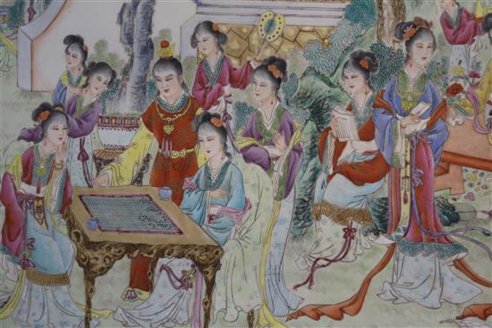 A large Chinese plaque of ladies in a garden